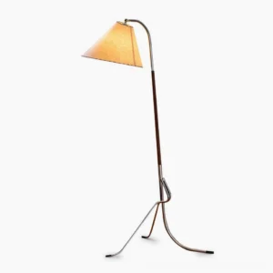 Mid-century tripod floor lamp with walnut wood legs and chrome accents, full frontal studio view showing conical beige fabric shade and geometric tripod base