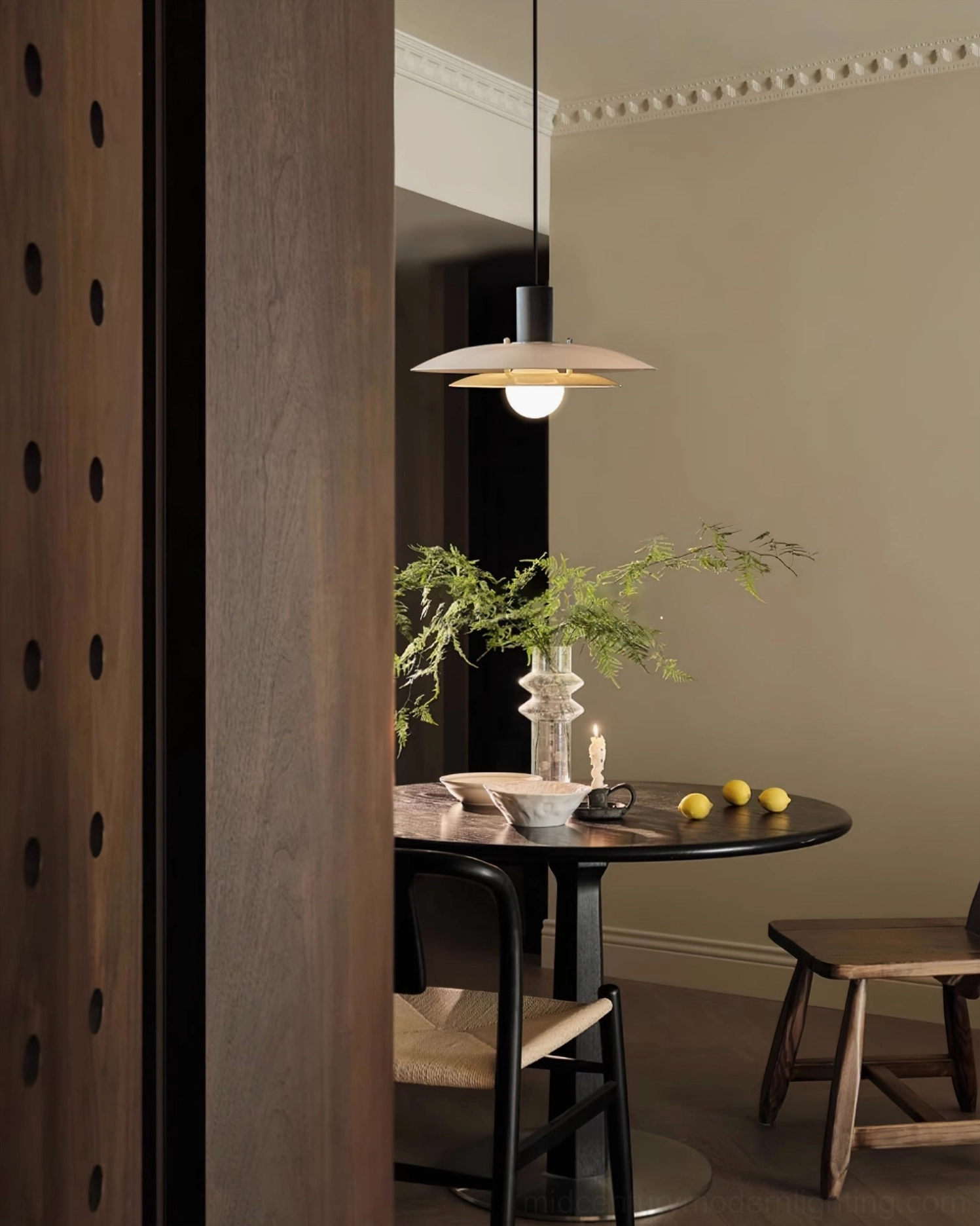 Mid-century modern wood pendant lamp installed in transitional kitchen displaying timeless Scandinavian aesthetics