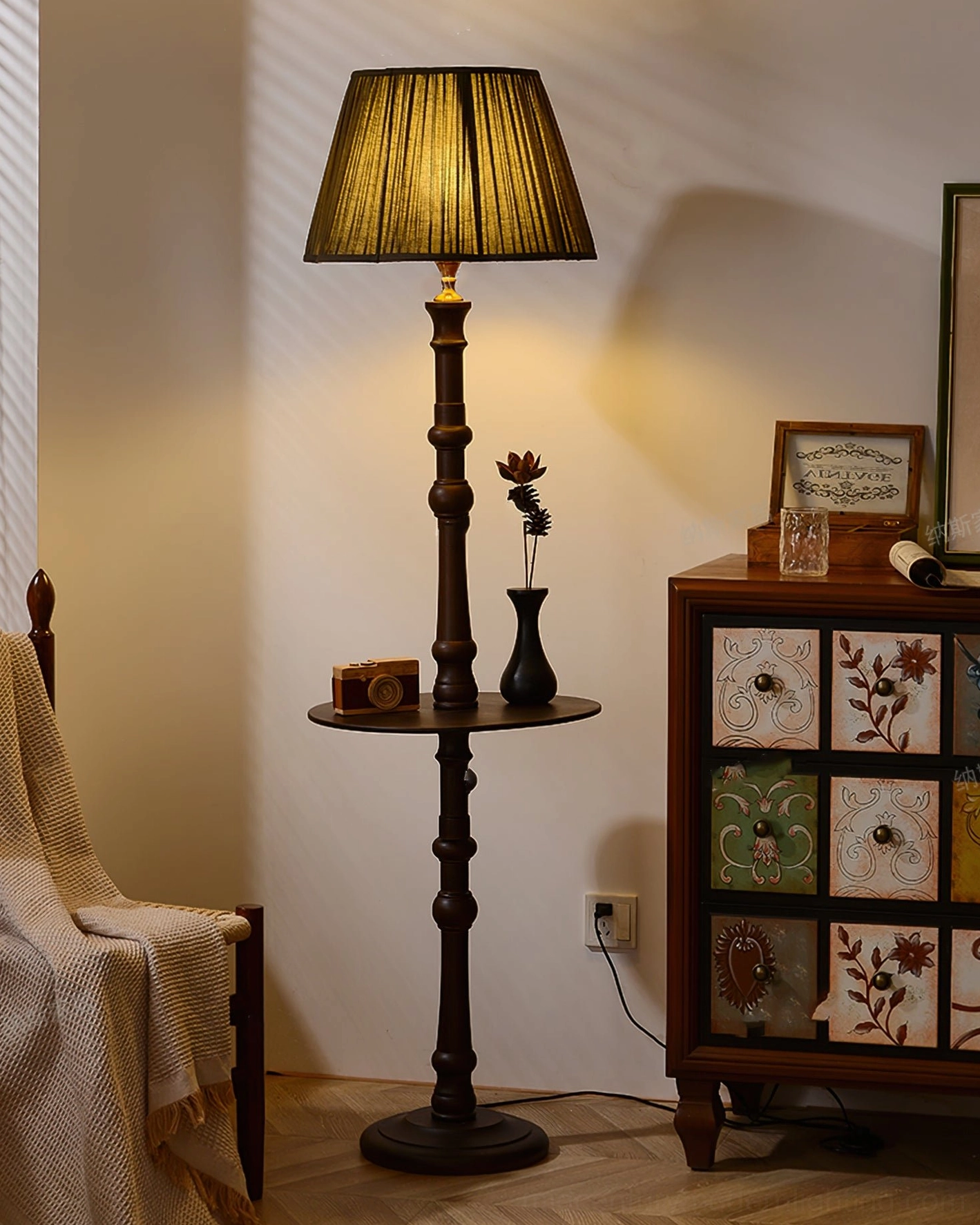 Mid-Century Modern Floor Lamp with dark wood pole and pleated lampshade in home interior
