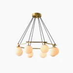 Miira Alabaster Chandelier front view with brass frame and warm frosted alabaster shades in studio lighting