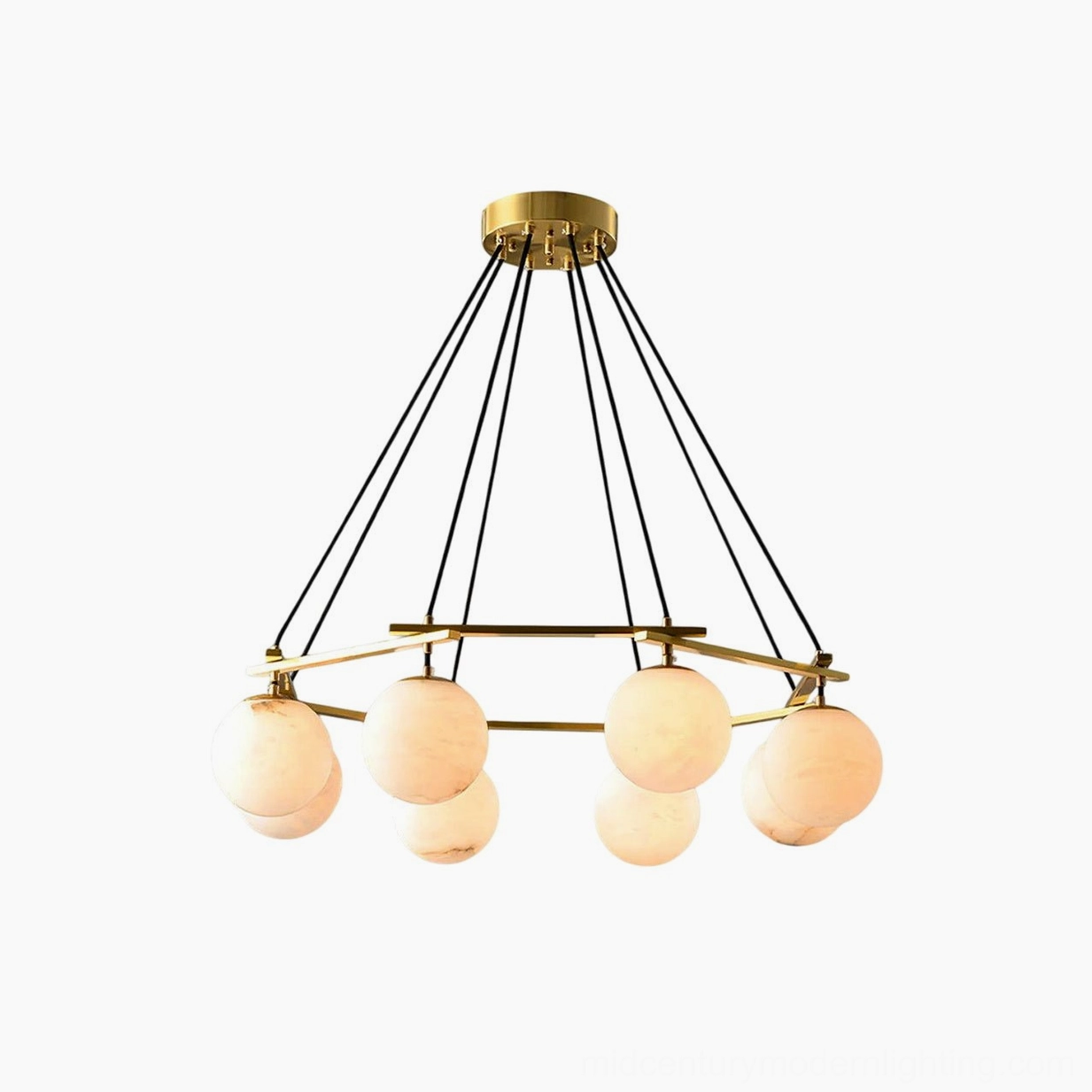 Miira Alabaster Chandelier front view with brass frame and warm frosted alabaster shades in studio lighting