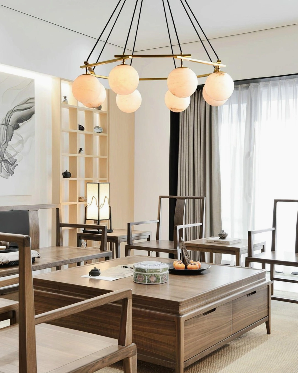 Miira Alabaster Chandelier in modern home office workspace with wood tones and contemporary furniture
