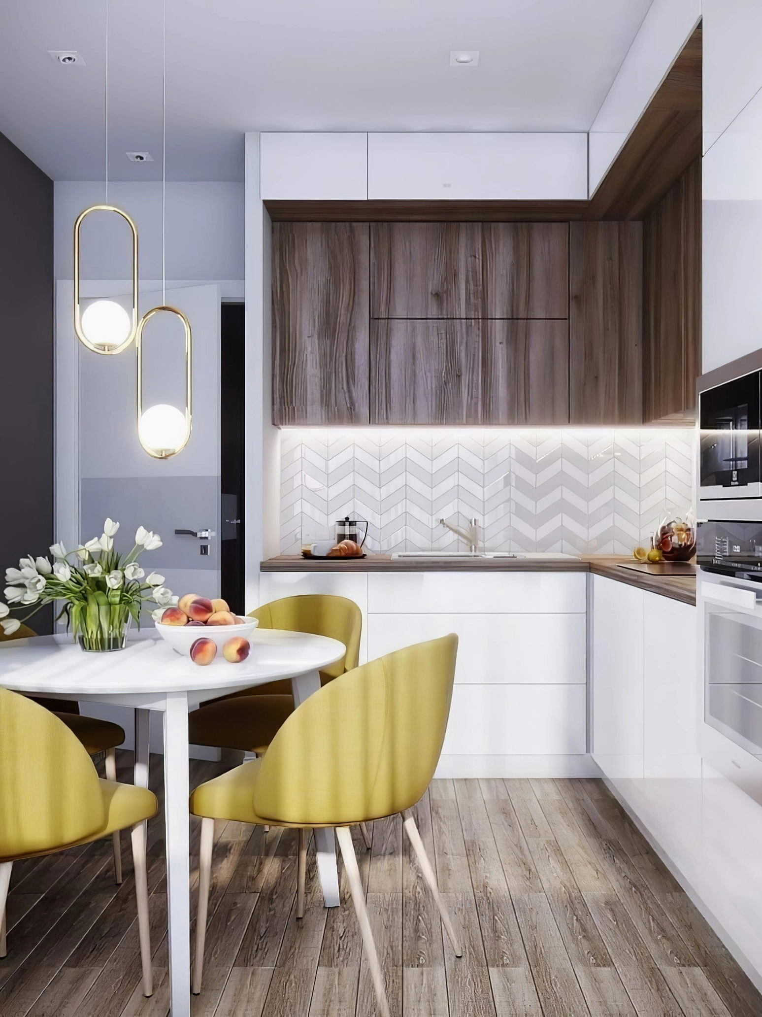 Pair of Mila pendant lamps with brass frames above kitchen dining area with mustard yellow chairs, contemporary pendant lighting design