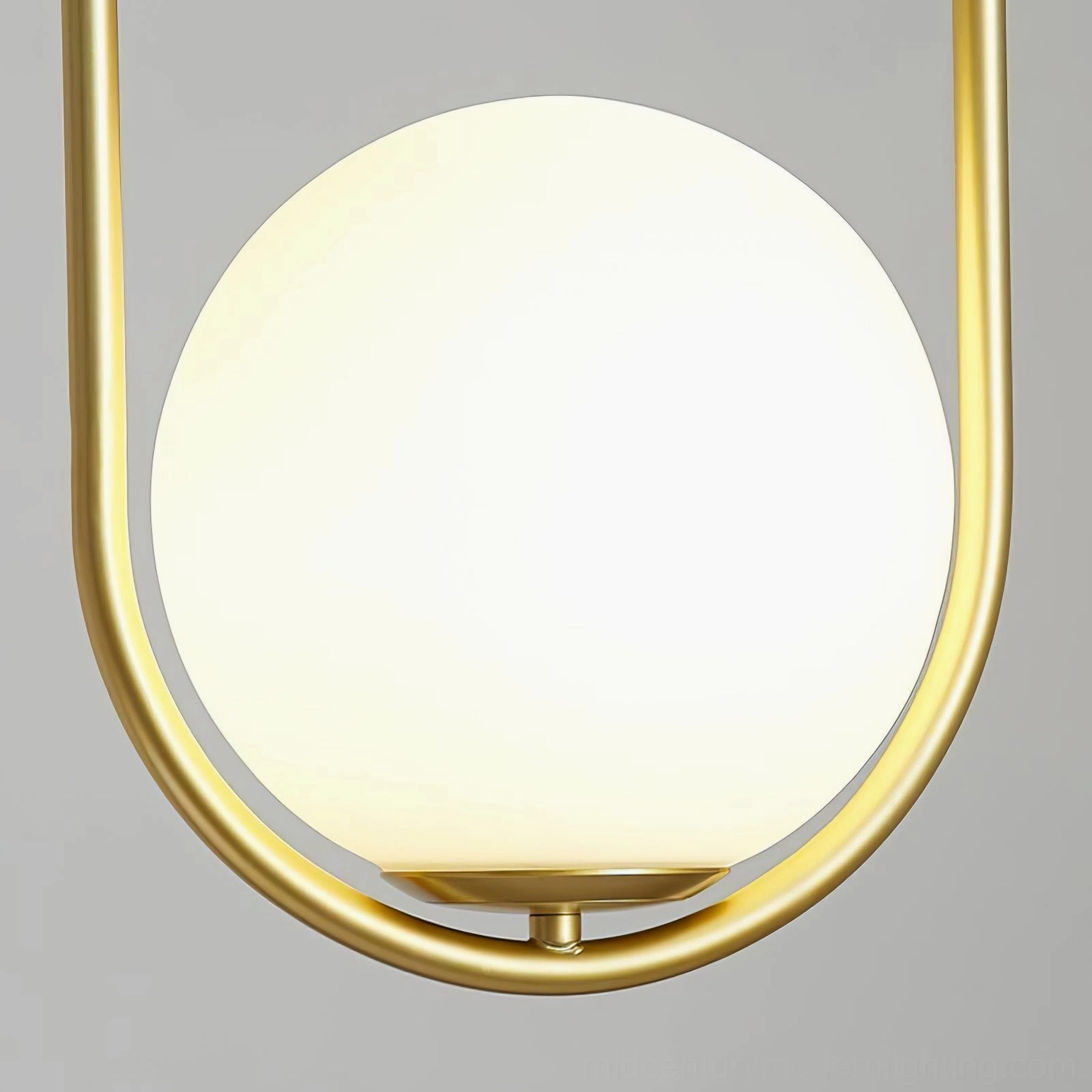 Mila contemporary pendant lamp with brass fixture and frosted glass, minimalist modern lighting for dining and living spaces