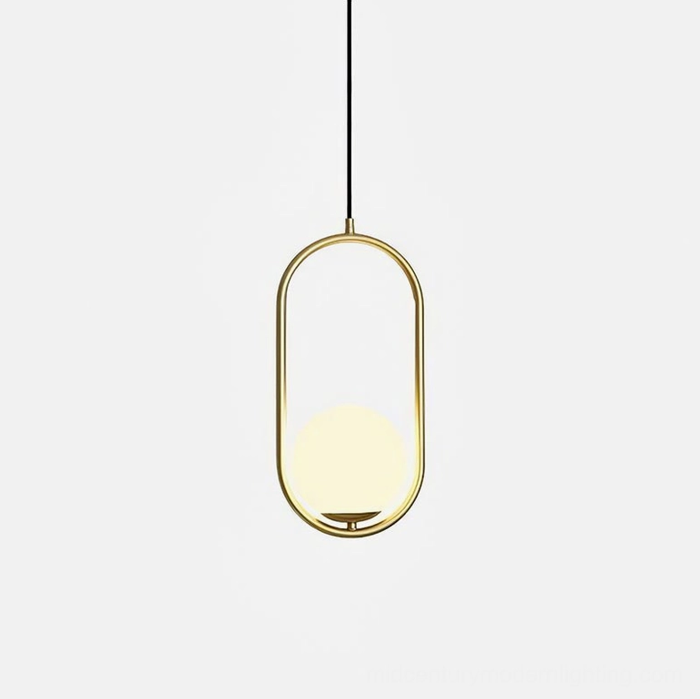 Mila pendant light fixture with brass metal frame and frosted white glass shade, elegant suspended lamp for modern interiors