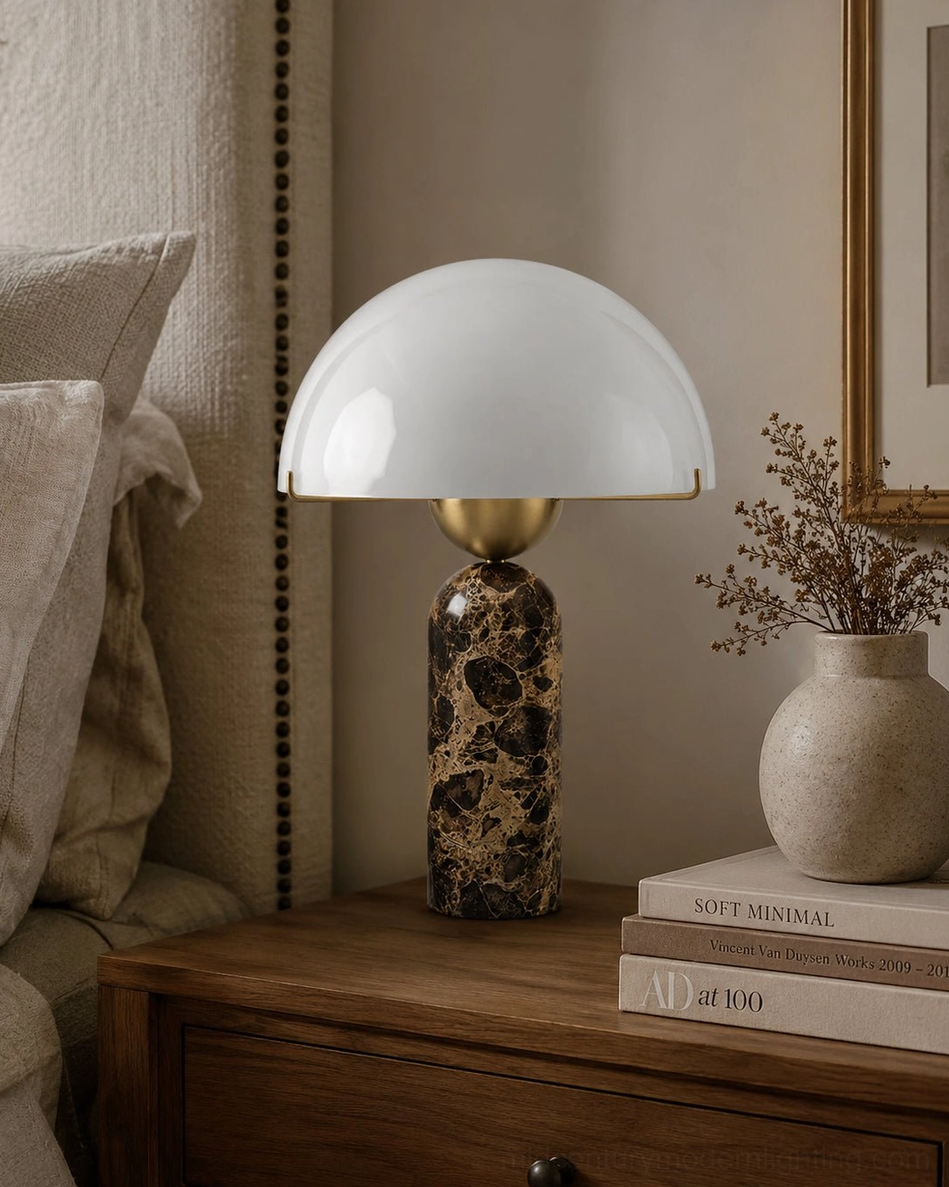Milano lamp with spotted marble base on bedroom nightstand beside dried floral arrangement and minimalist decor