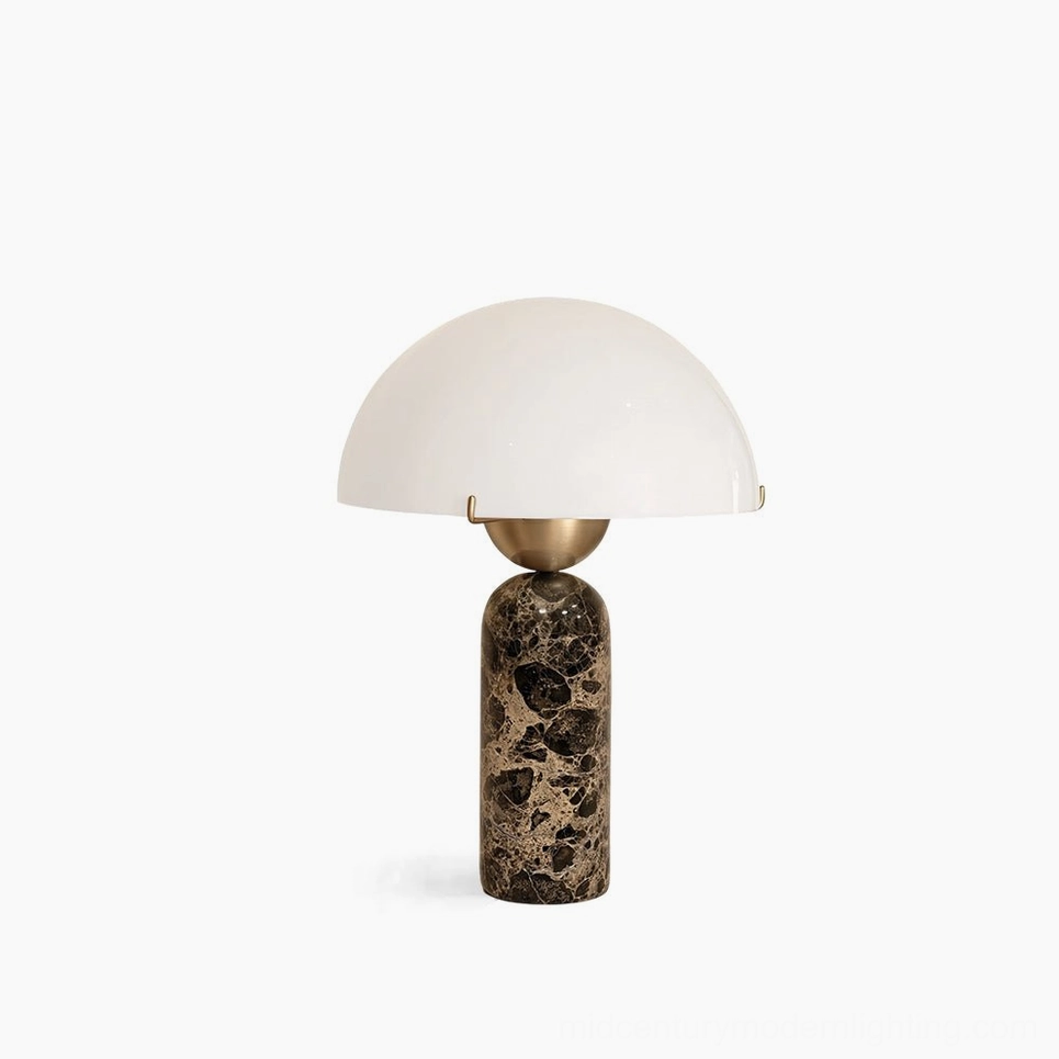 Milano marble table lamp with white frosted glass dome shade and spotted natural marble base, photographed against neutral studio background