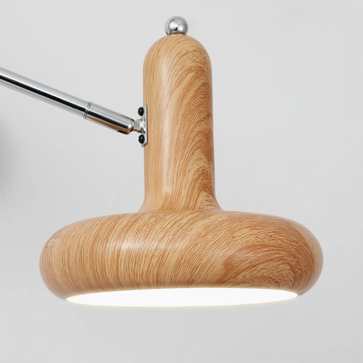 Milena contemporary wall sconce with fully adjustable swing arm mechanism for directional task lighting in modern interiors