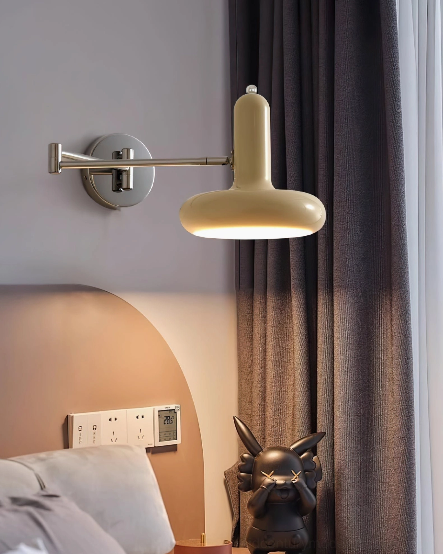 Milena wall-mounted swing arm lamp in creamy beige with polished chrome accents, bedroom ambient lighting