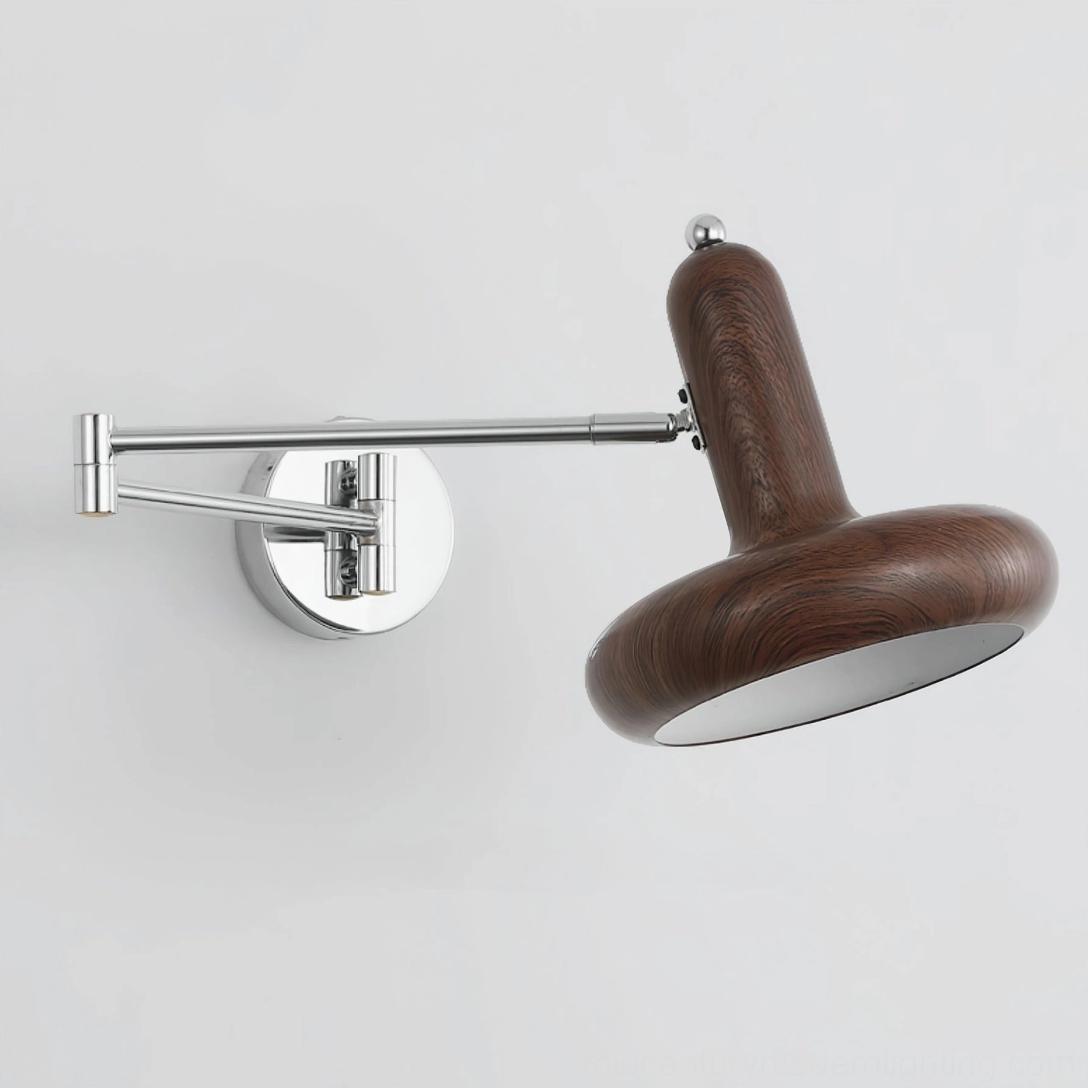 Milena adjustable wall sconce in modern minimalist bedroom showing shadow patterns created by swing arm design at night