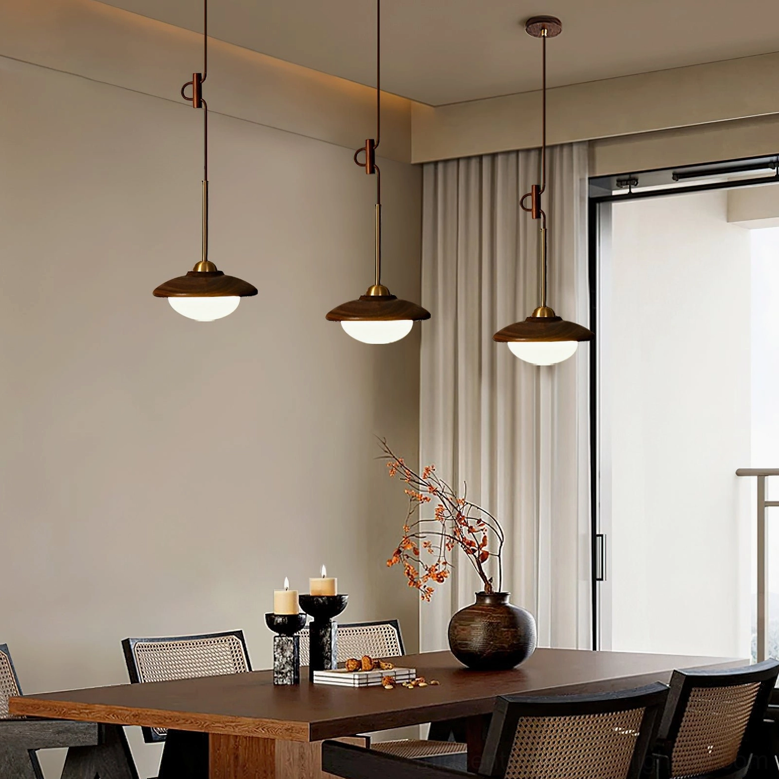 Triple Milivia pendant light fixtures in dining room with balcony - soft warm ambient glow