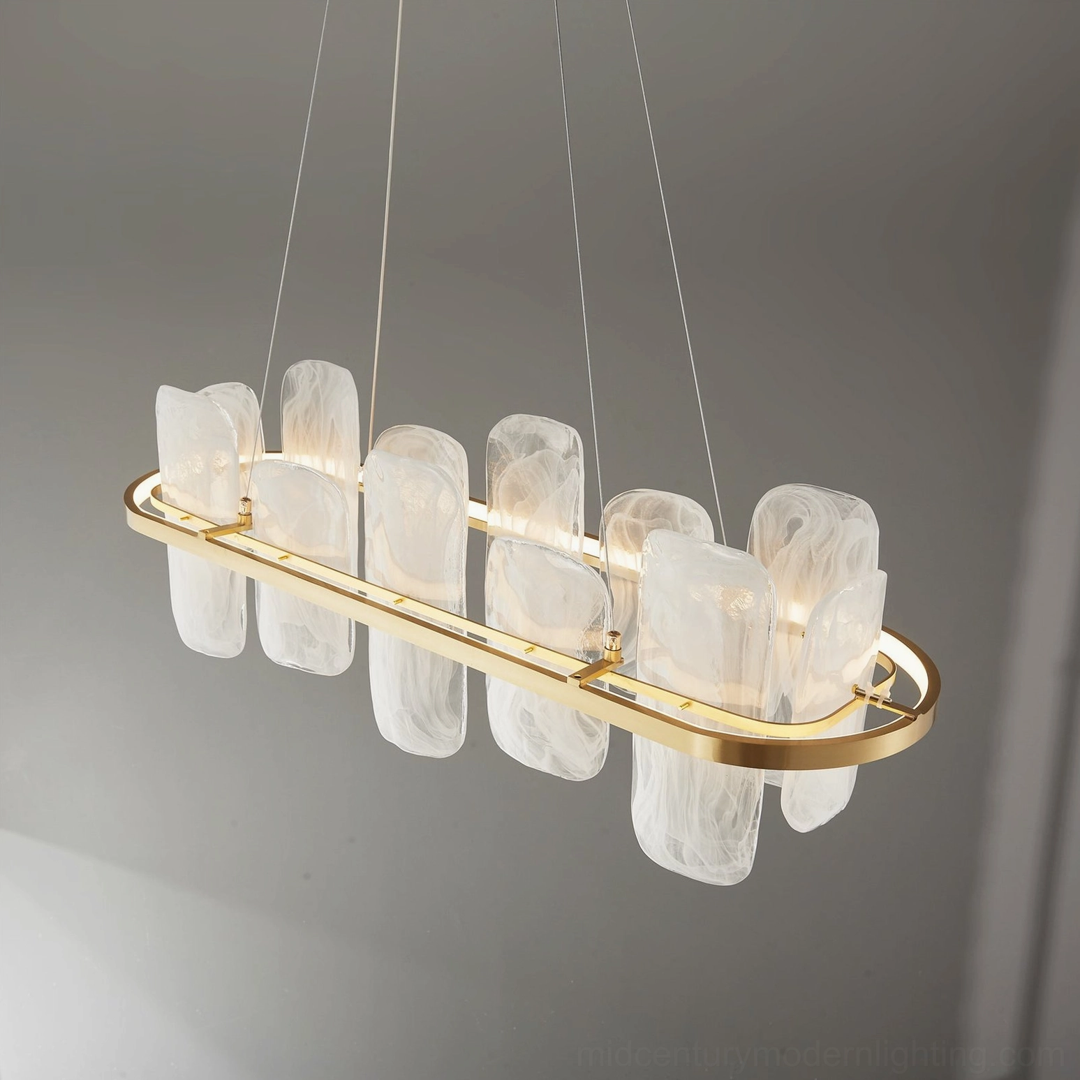 Bottom perspective of Mille glass chandelier with frosted shade arrangement and brass framework