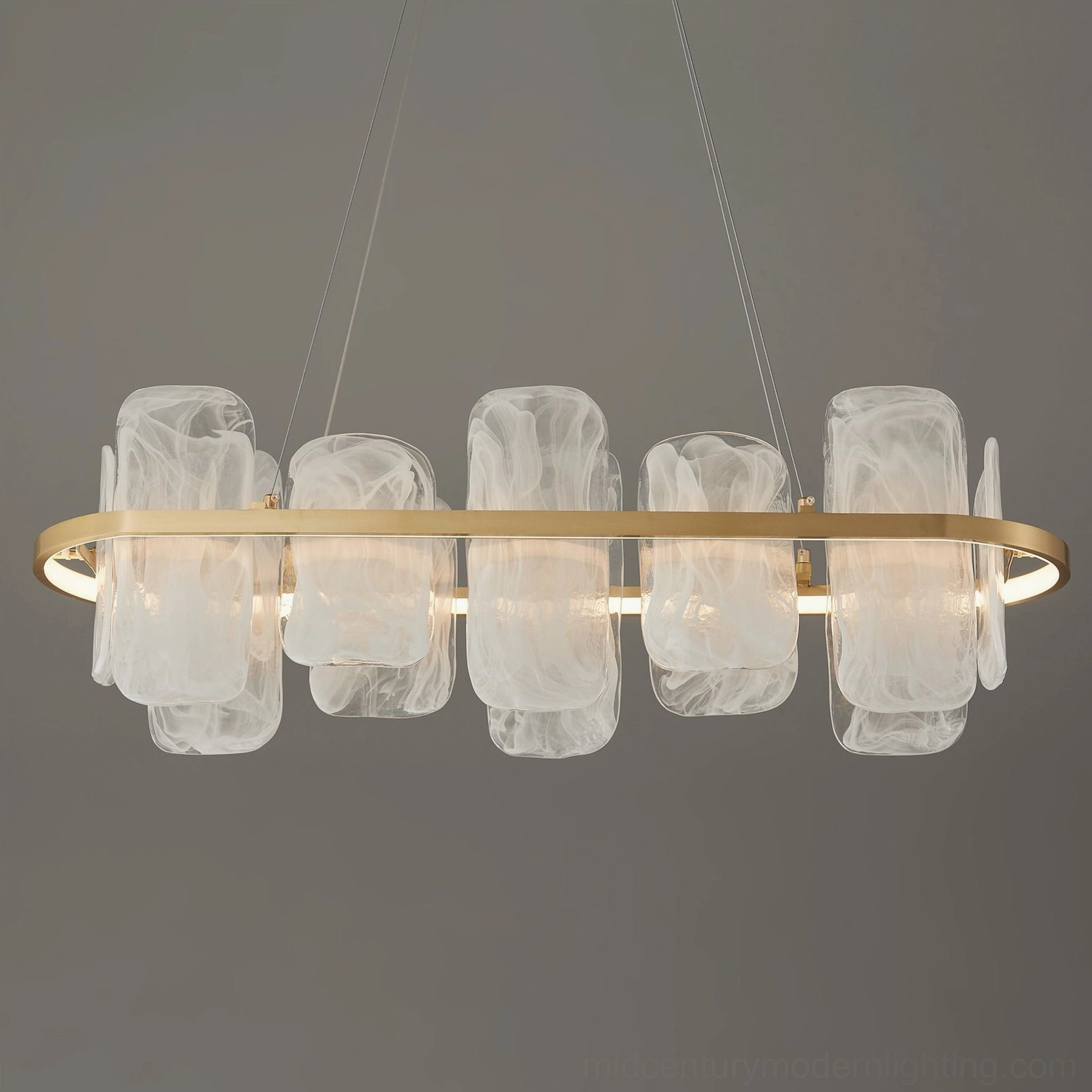 Mille chandelier with five cloud-textured glass pendants arranged on oval brass ring