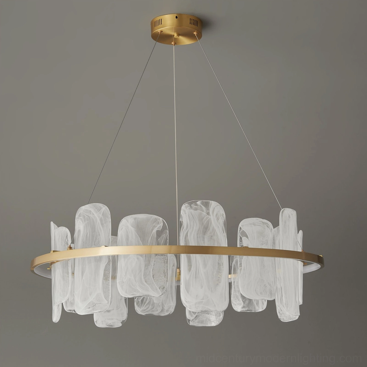 Mille Round Glass Chandelier side angle studio shot highlighting sculptural brass form