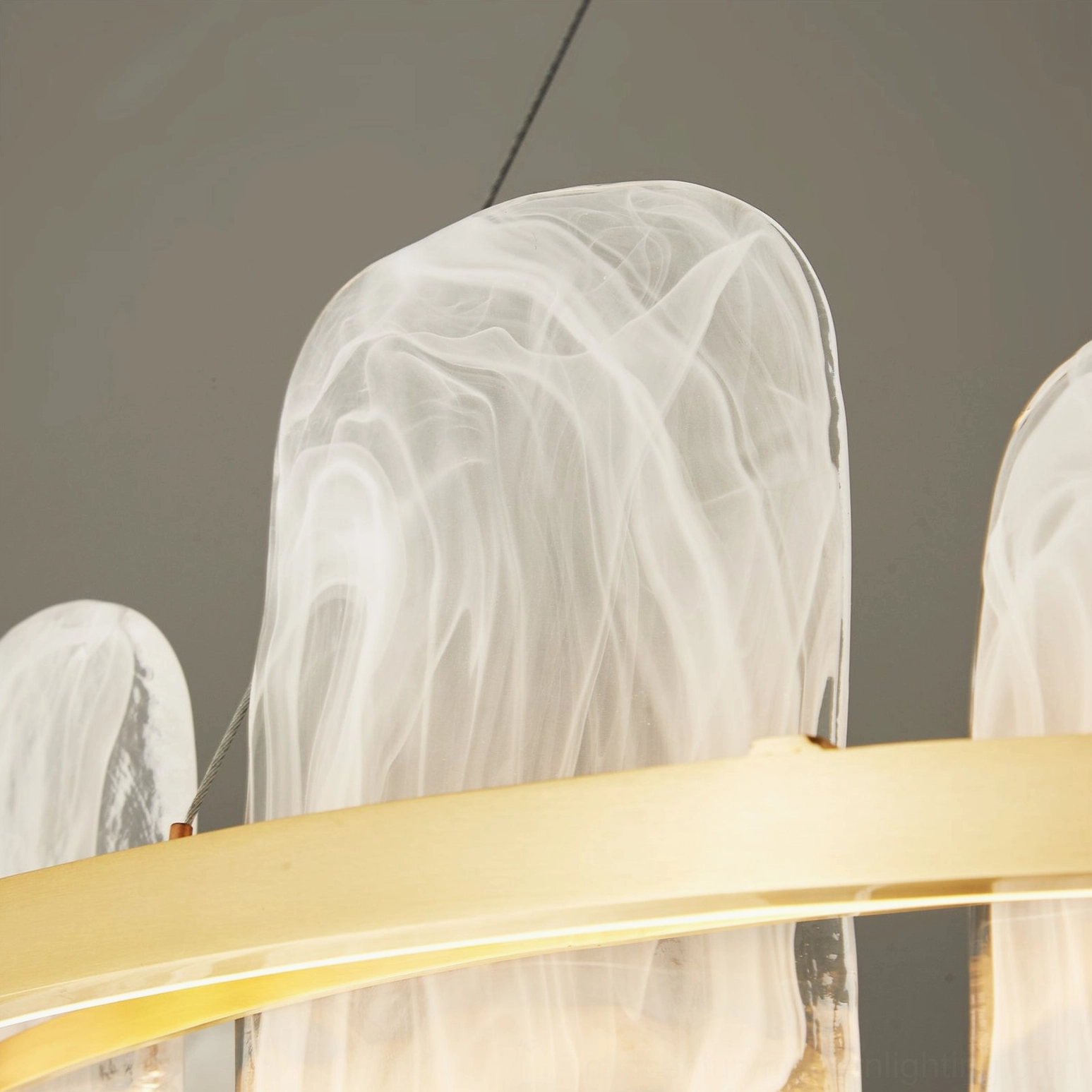Mille Round Glass Chandelier translucent smoky glass pendants with brass mounting hardware detail