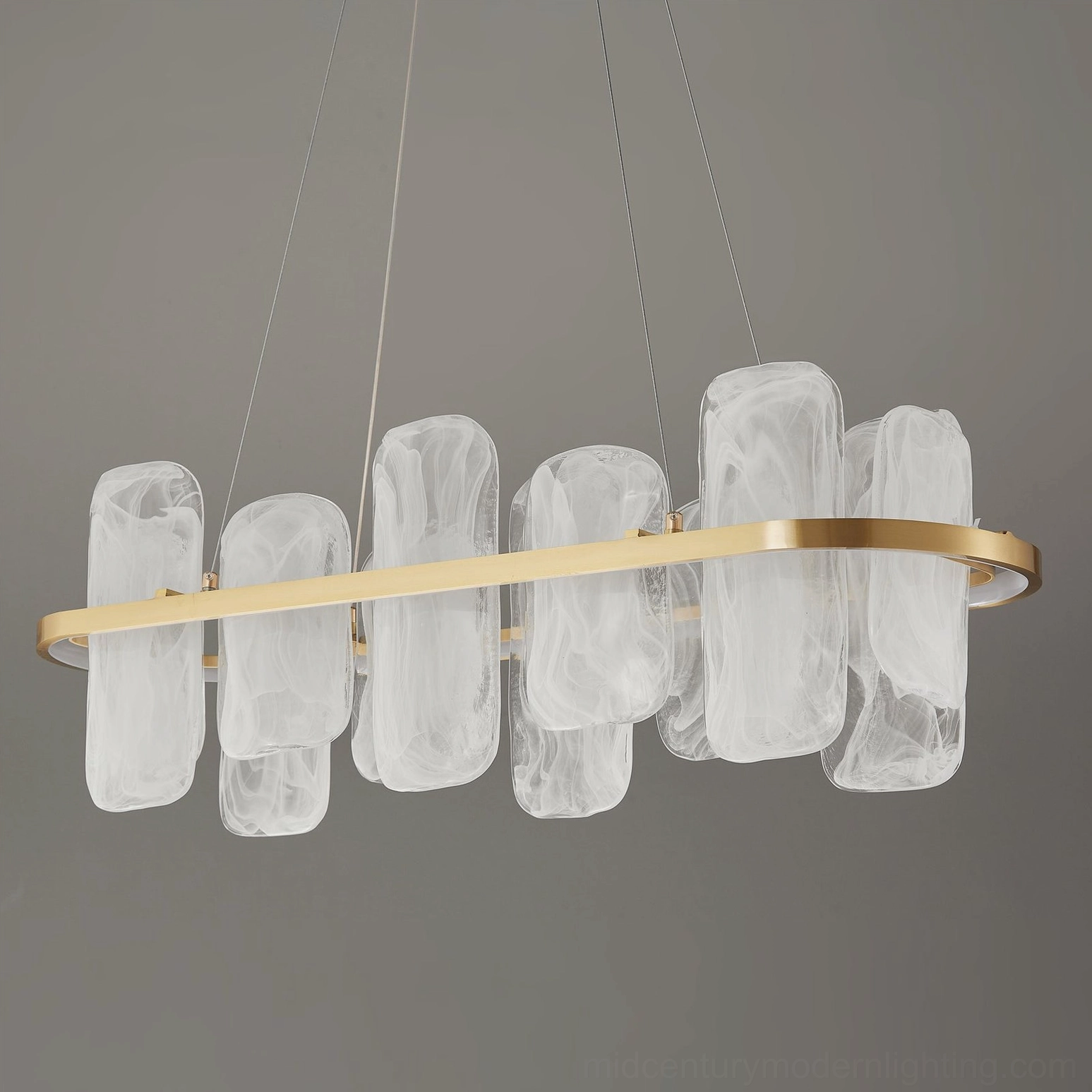 Mille oval chandelier with six cloud-glass shade units on brushed brass frame and suspension system