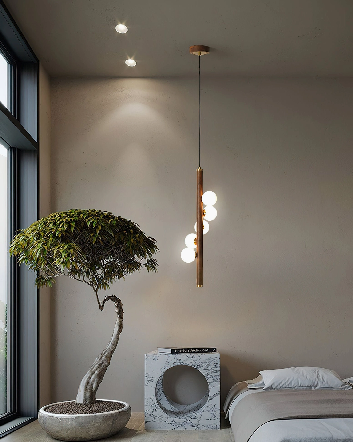 Miller wooden pendant in simple minimalist bedroom with warm wood rod and three illuminated spherical glass bulbs