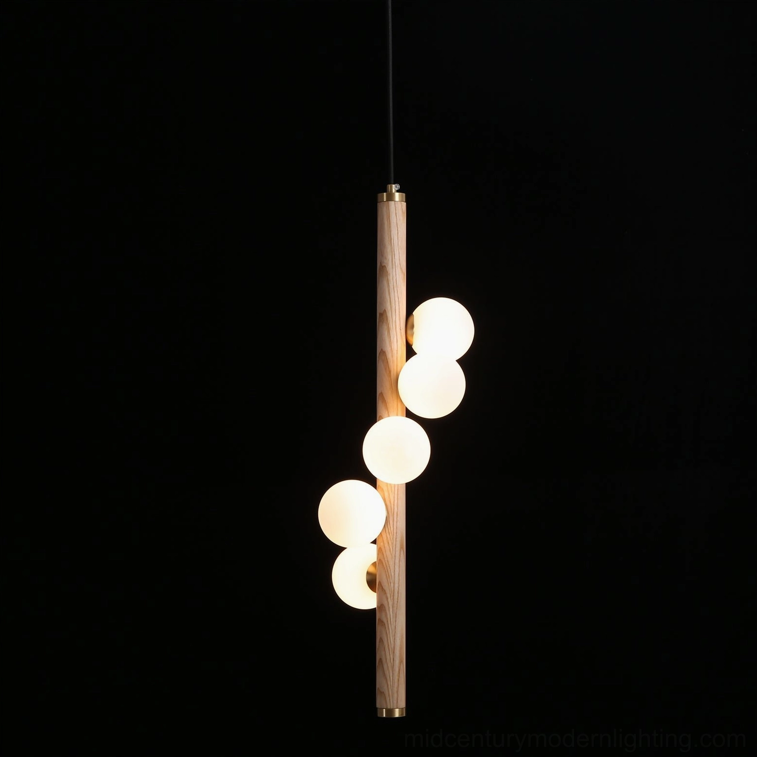 Miller wooden pendant light with natural wood finish, minimalist Scandinavian design aesthetic