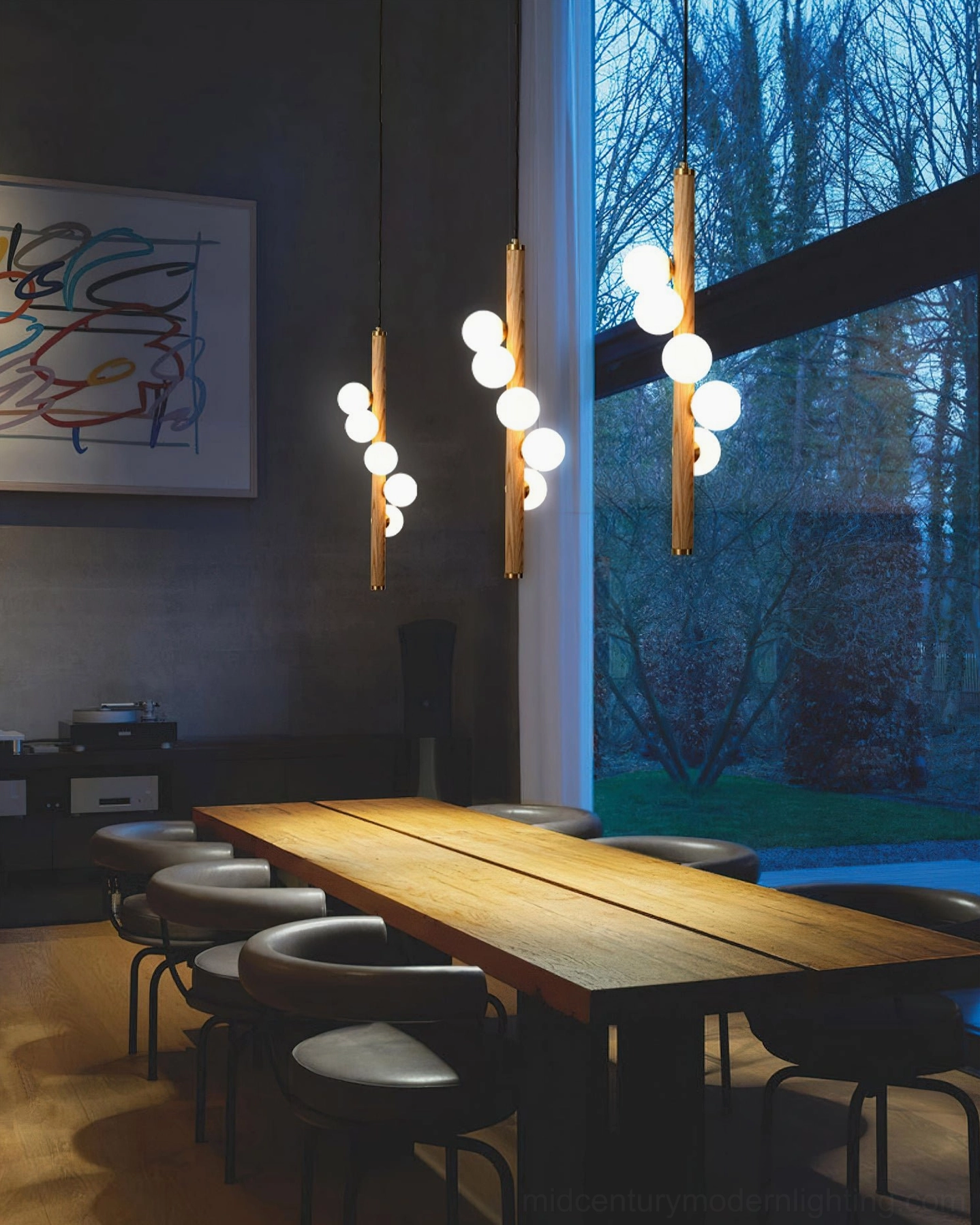 Triple Miller pendant lights in upscale dining room, asymmetrical bulb placement with city view through large windows