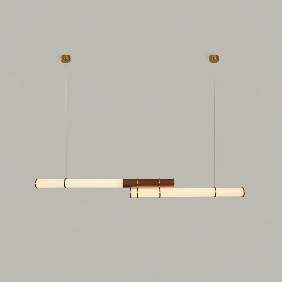 Compact Mini Endless Double pendant above smaller dining surface in space-conscious interior layout
