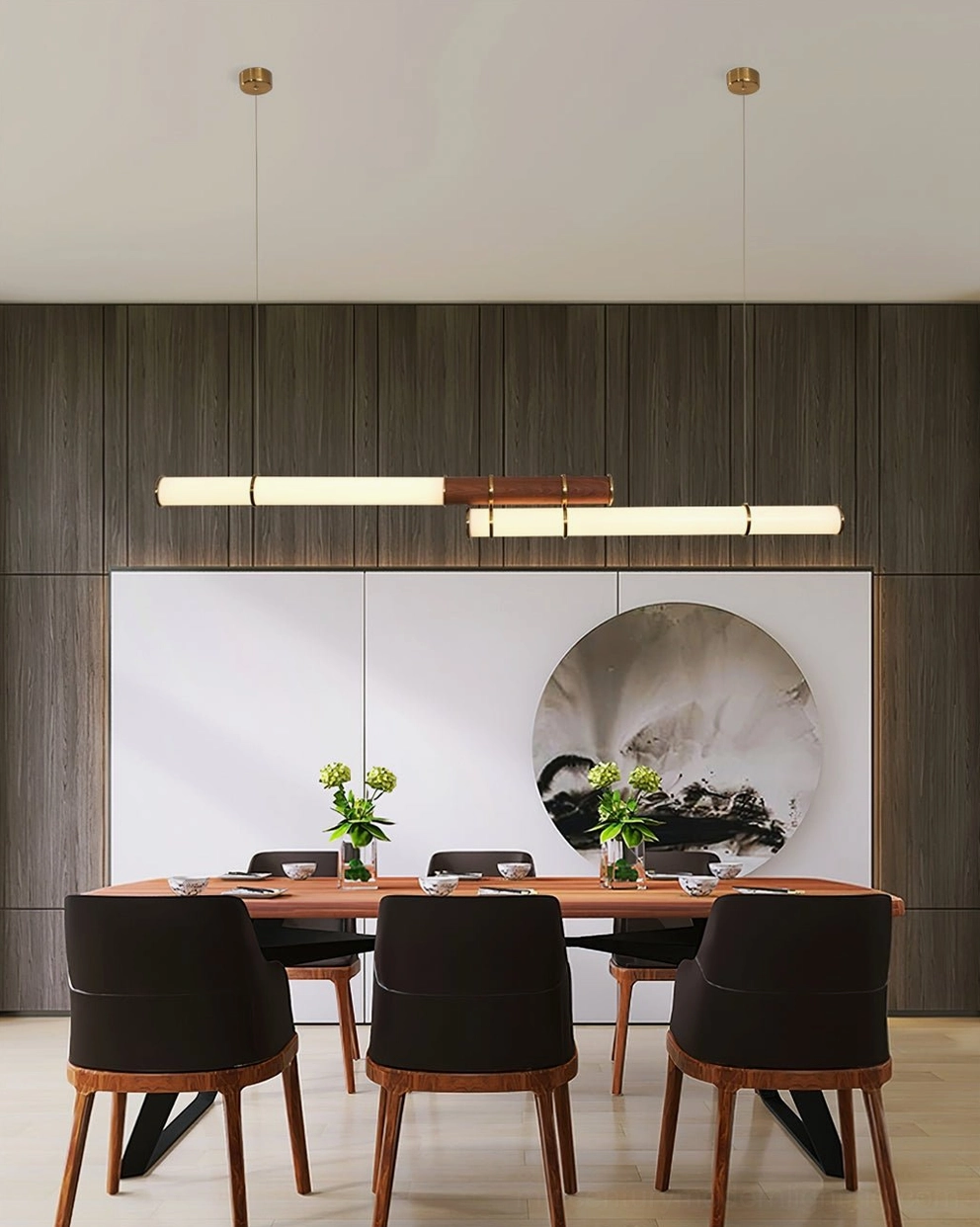 Luxury dining space with Mini Endless Double pendant suspended above formal wooden dining set and dark wood panel walls