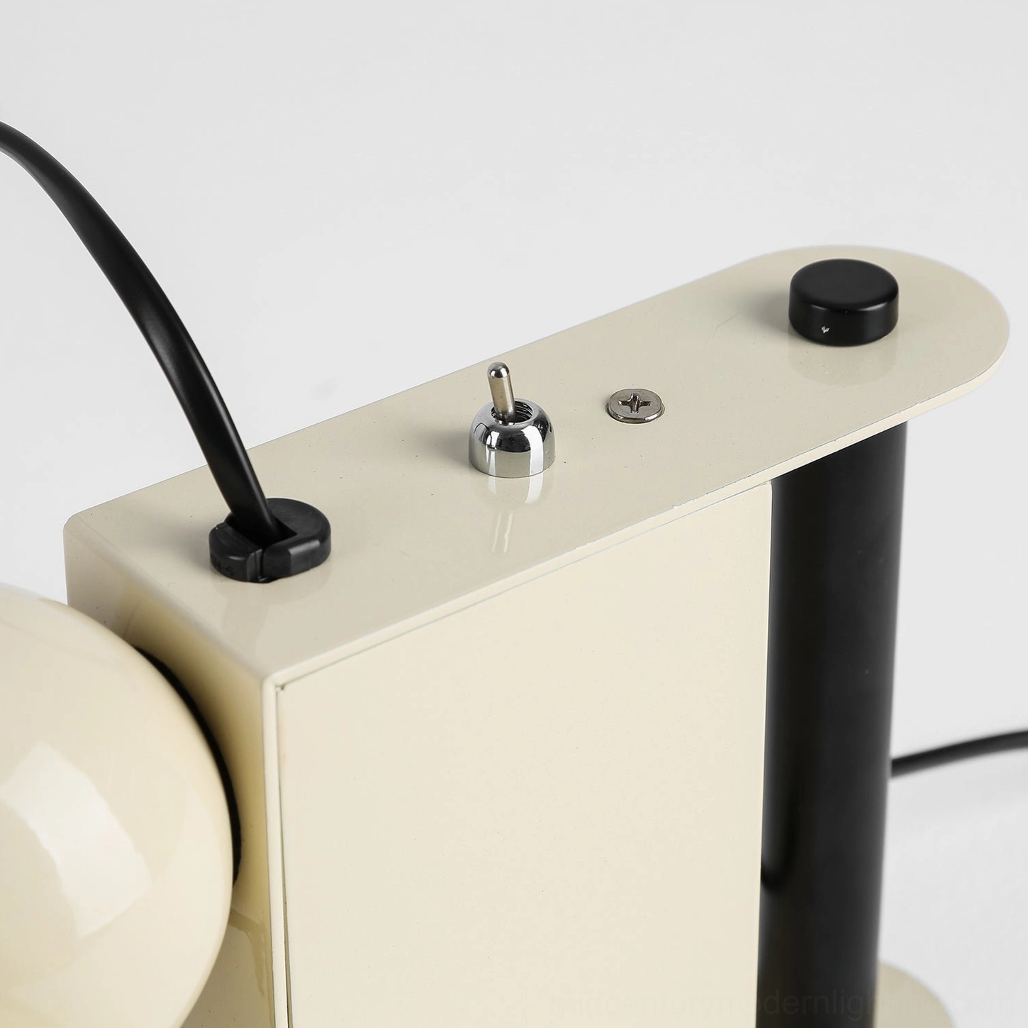 Black Minibox compact spotlight table lamp, three-quarter studio view, modern industrial aesthetic