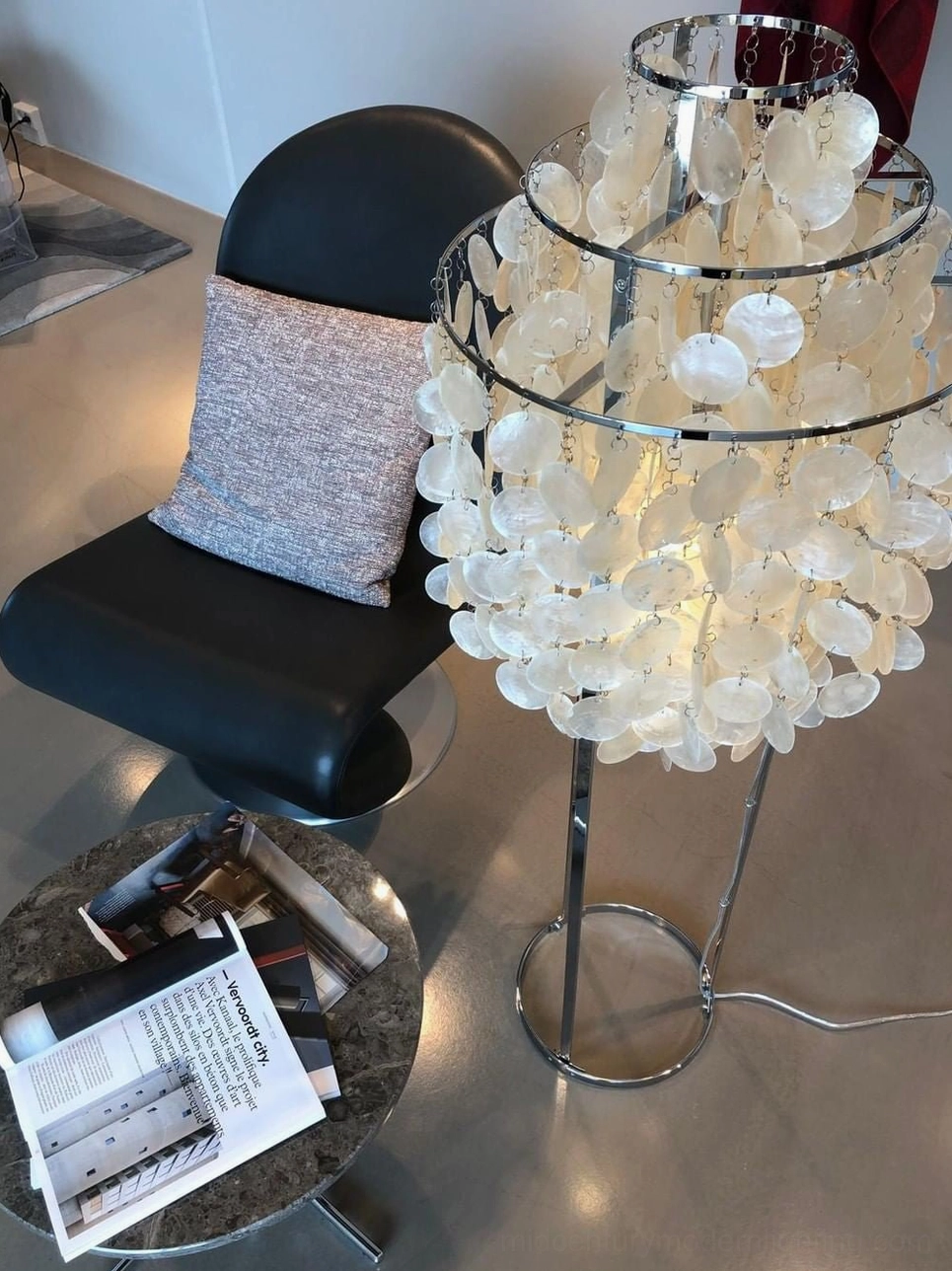 Minimalist interior design featuring natural capiz shell floor lamp as focal point