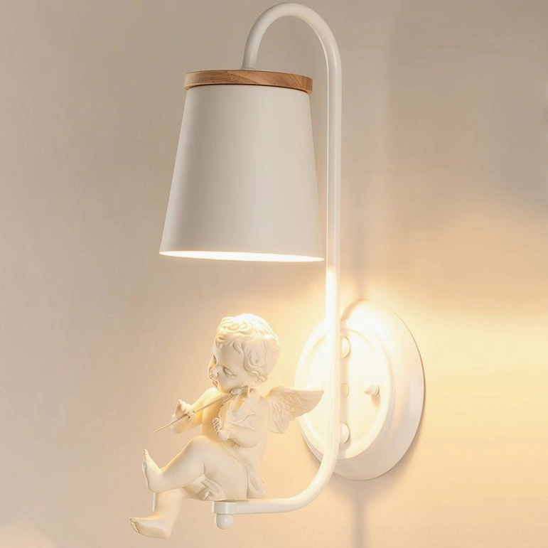 Cupid playing flute angel wall sconce on plain beige indoor wall with minimalist scandinavian styling
