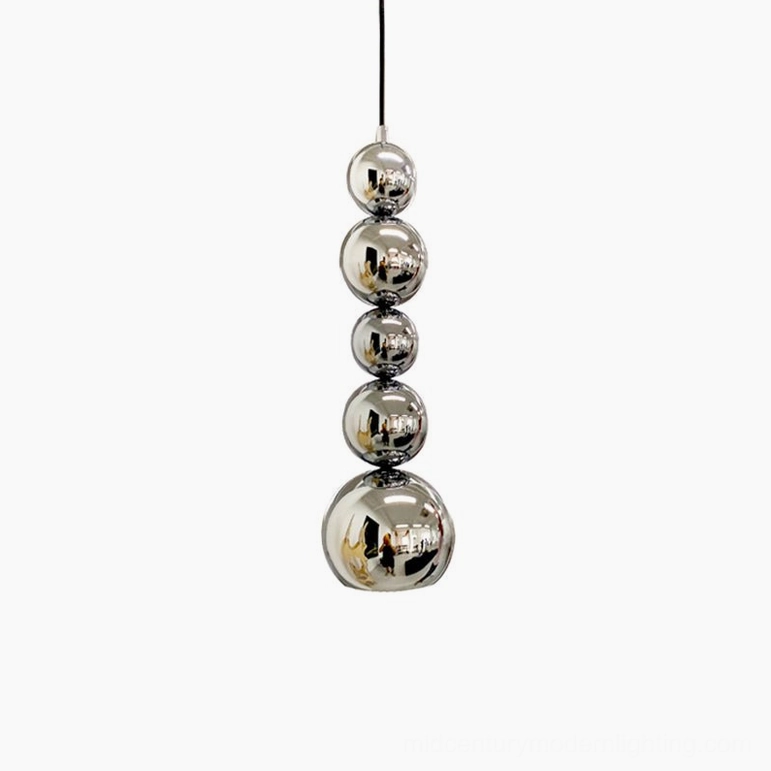 Chrome globe pendant suspension lamp highlighting minimalist spherical geometry and contemporary design