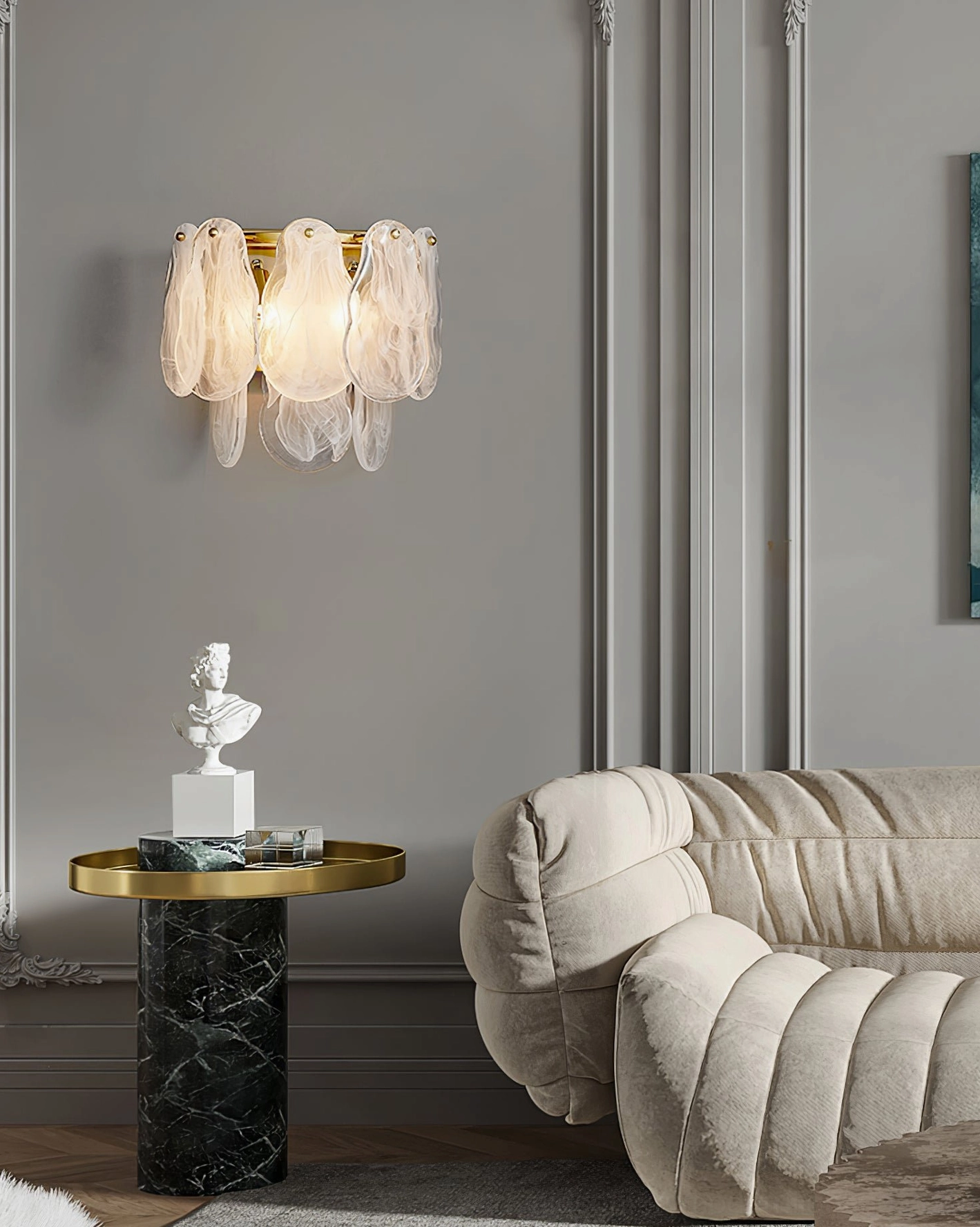 Cloud glass wall sconce in modern living room with tufted sofa, side angle showing luxury minimalist style and warm ambient lighting