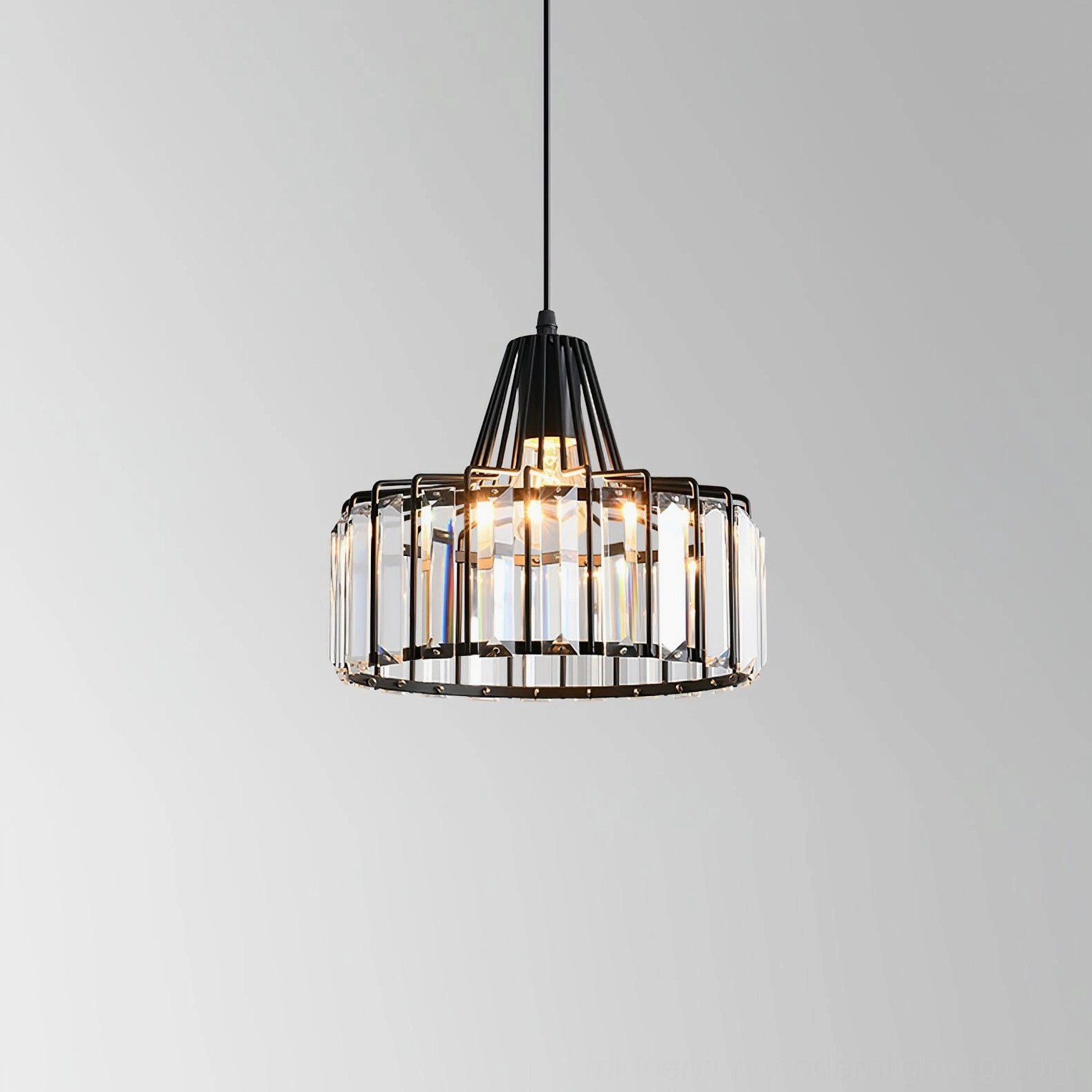 Contemporary minimalist crystal pendant light with sophisticated black or gold finishes