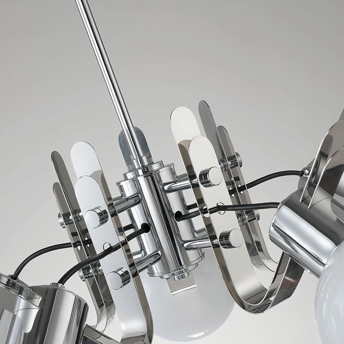 Minimalist geometric glass chandelier with clean chrome lines and sculptural sphere design
