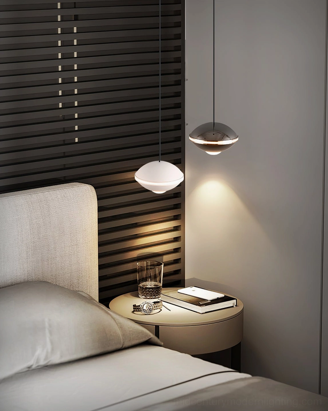 Modern minimalist saucer pendant lamp, sleek metal construction, contemporary bedroom lighting