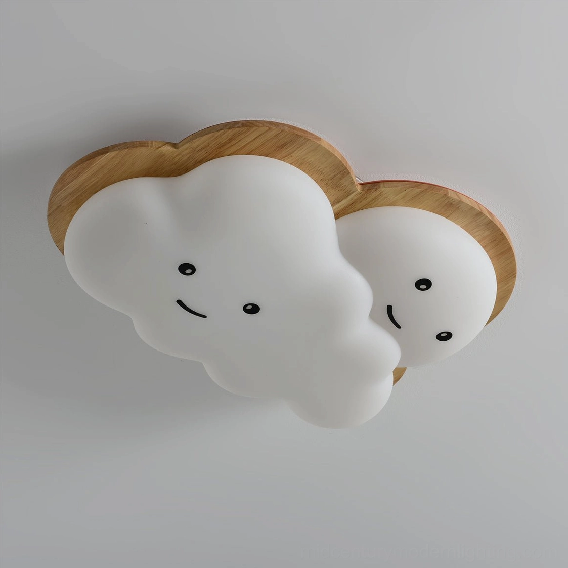 Minimalist smiling cloud ceiling lamp creating warm ambient light in Scandinavian-style children's room