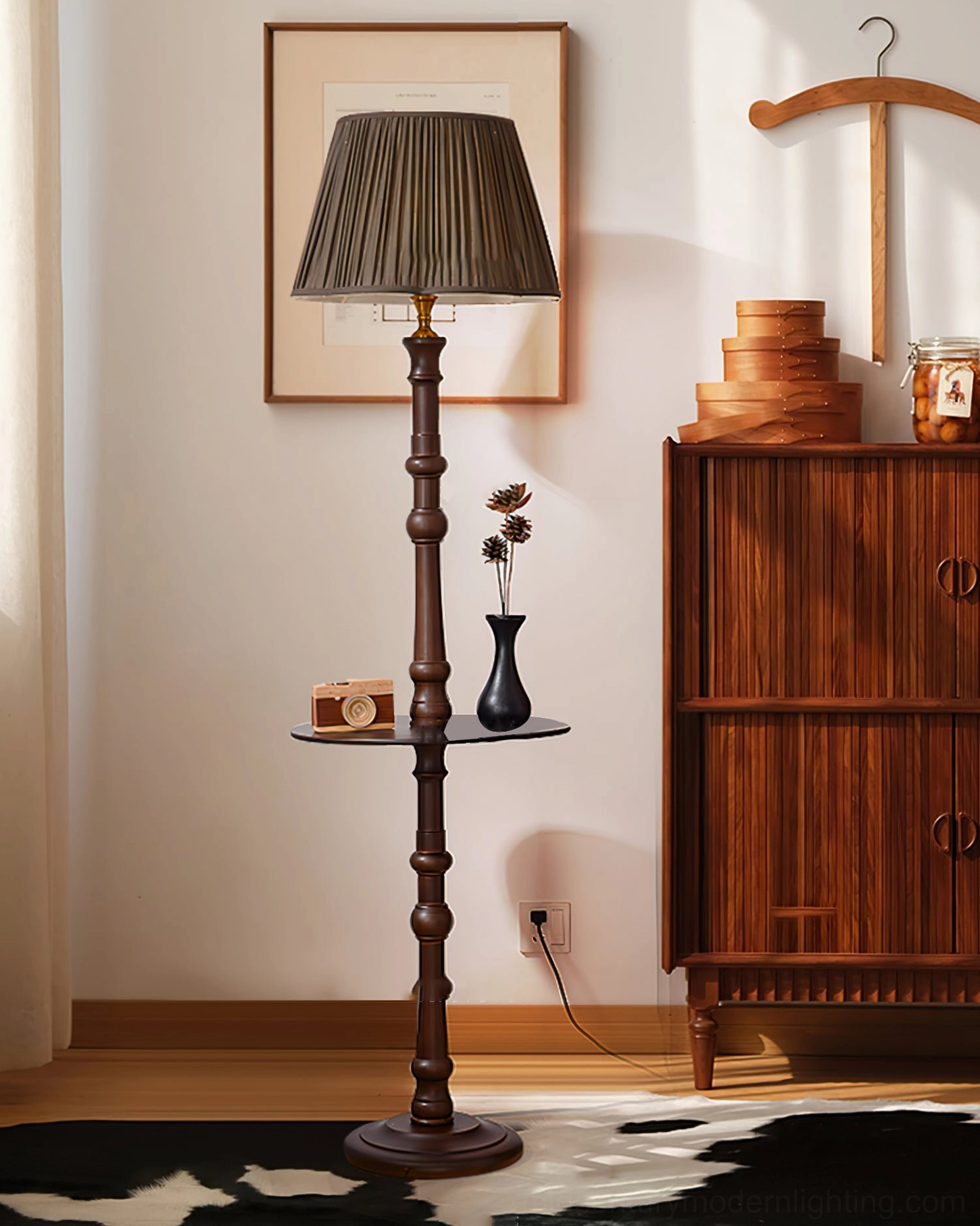 Minimalist vintage floor lamp with pleated dark shade on wooden pole, side table tray detail