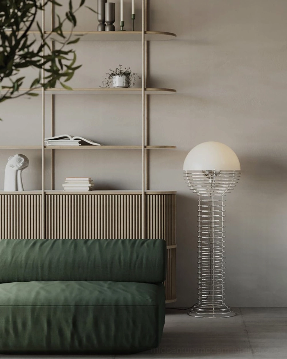 Minimalist wire floor lamp detail showing chrome-plated steel frame and spherical white plastic shade construction