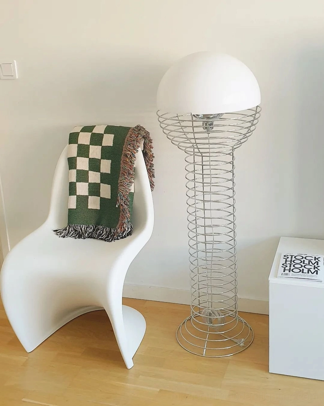 Minimalist wire floor lamp architectural frame detail showing steel construction and wire geometry