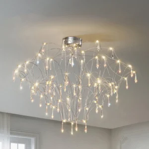 Mira crystal chandelier installed in minimalist grey living room with warm LED lighting and firework-style crystal arrangement, low-angle ceiling view