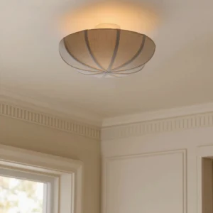 Miramar flush mount ceiling light installed in neutral residential interior with crown molding, ambient warm lighting