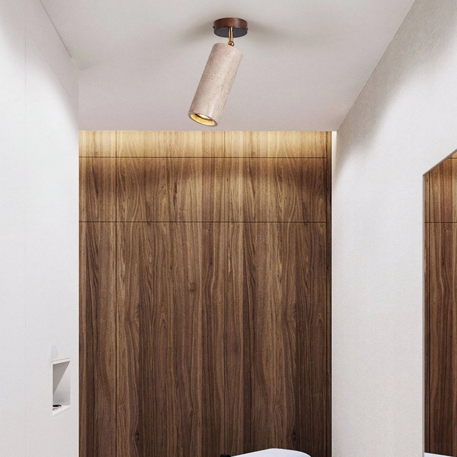 Mireille travertine ceiling light above wooden accent wall in warm minimalist bedroom interior design setting