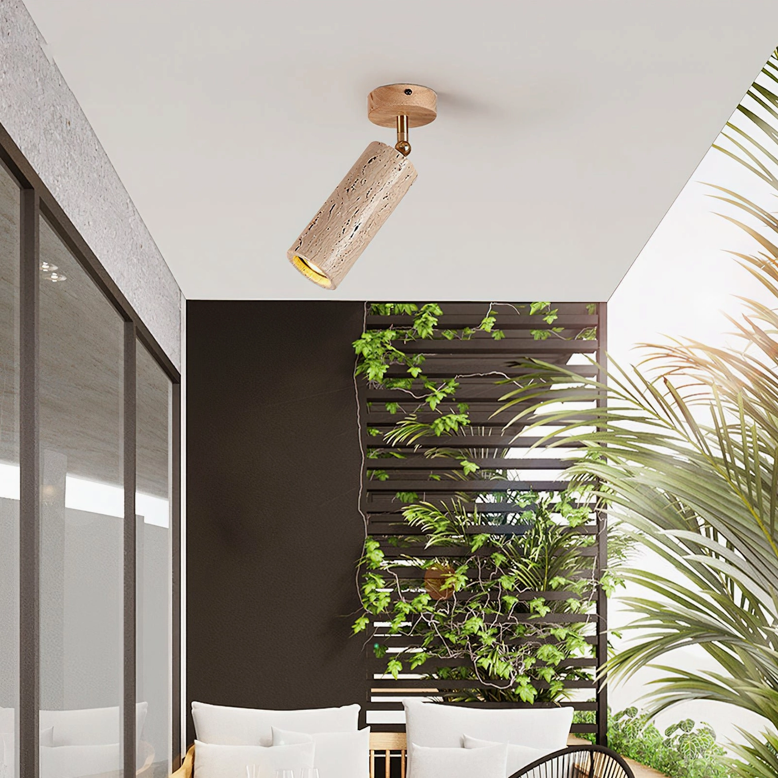 Mireille ceiling light installed in modern lounge interior with tropical minimalist decor and green plant accents