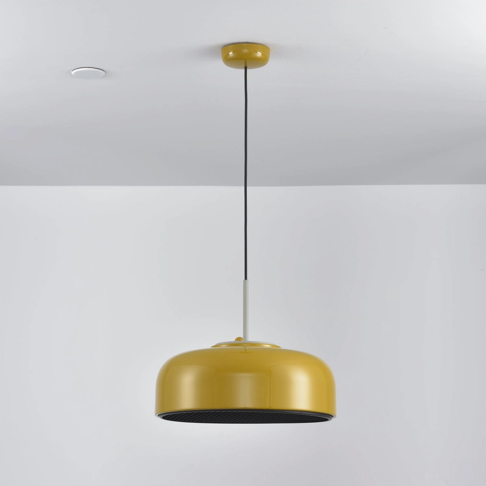 Misha mid-century modern pendant fixture in contemporary interior design setting