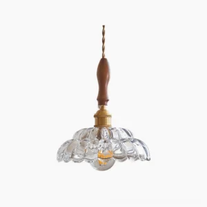 Misisco geometric pendant lamp with clear fluted glass shade, polished brass socket and walnut wood accent on white background
