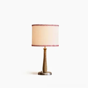 Mitchell baseball bat table lamp with wooden pole, chrome base, and embroidered baseball stitch linen shade—front view on white background