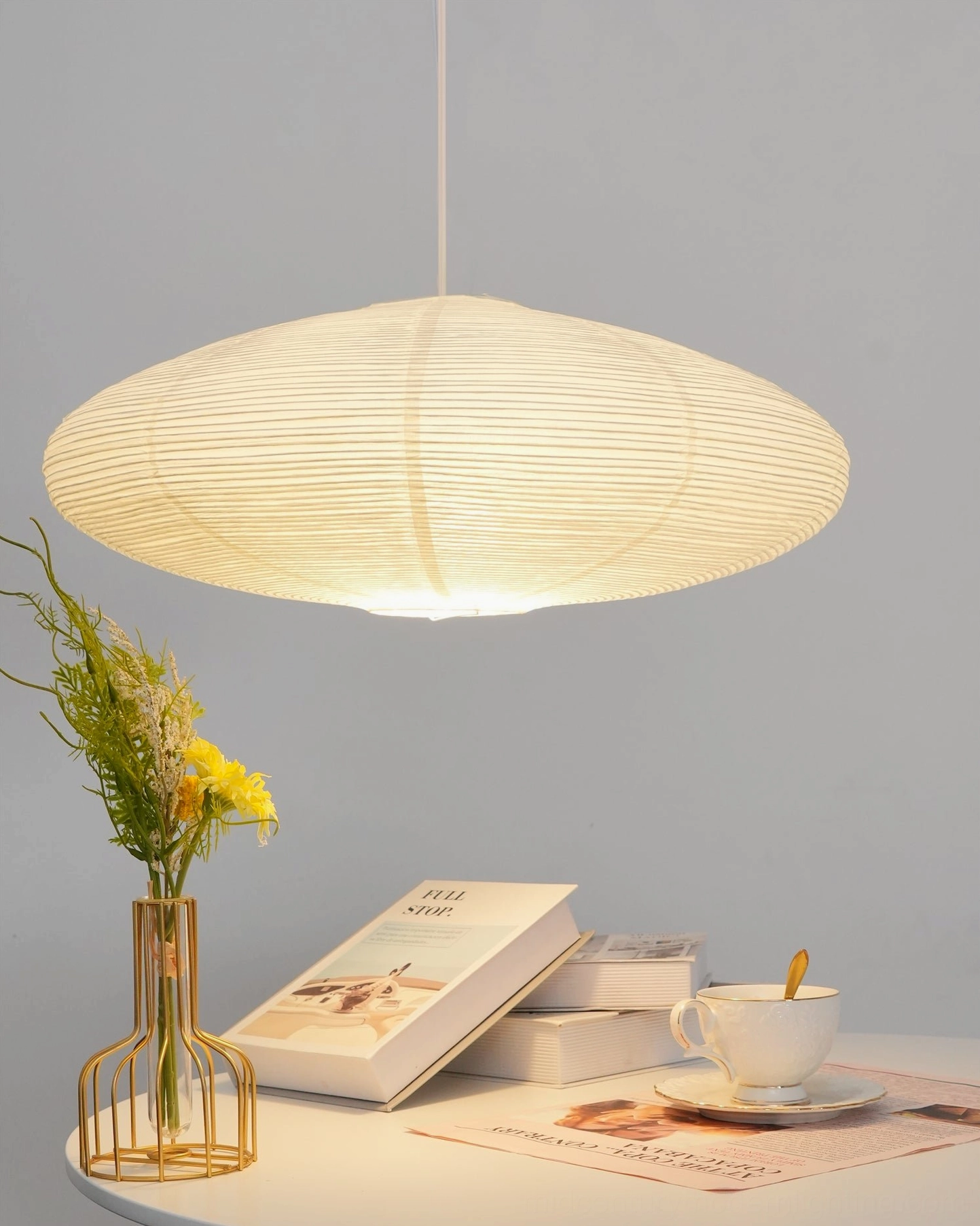 Model 21A mid-size washi pendant light with white metal frame and natural mulberry paper shade