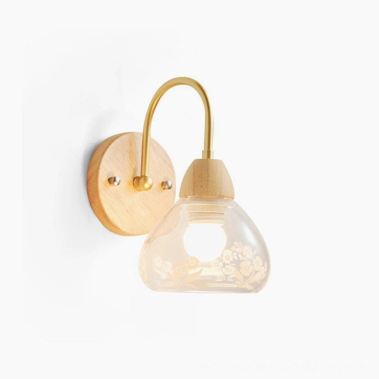 Model A armed wall lamp with brass arm and botanical etched glass shade