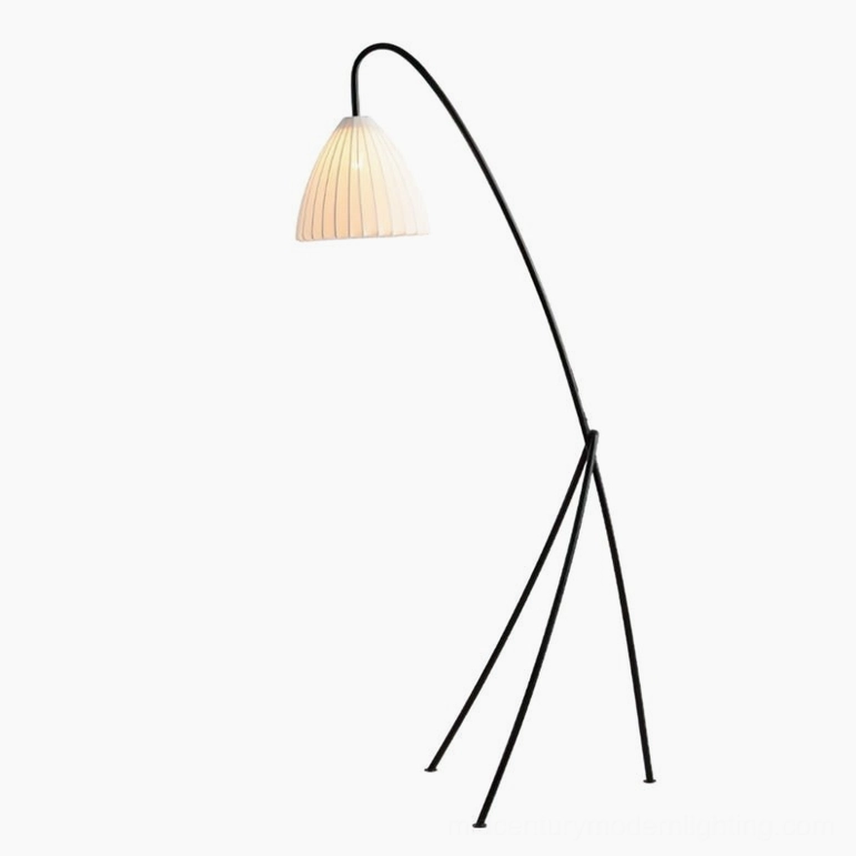 White or black tripod floor lamp showing Model A design variant with full height perspective in contemporary interior setting