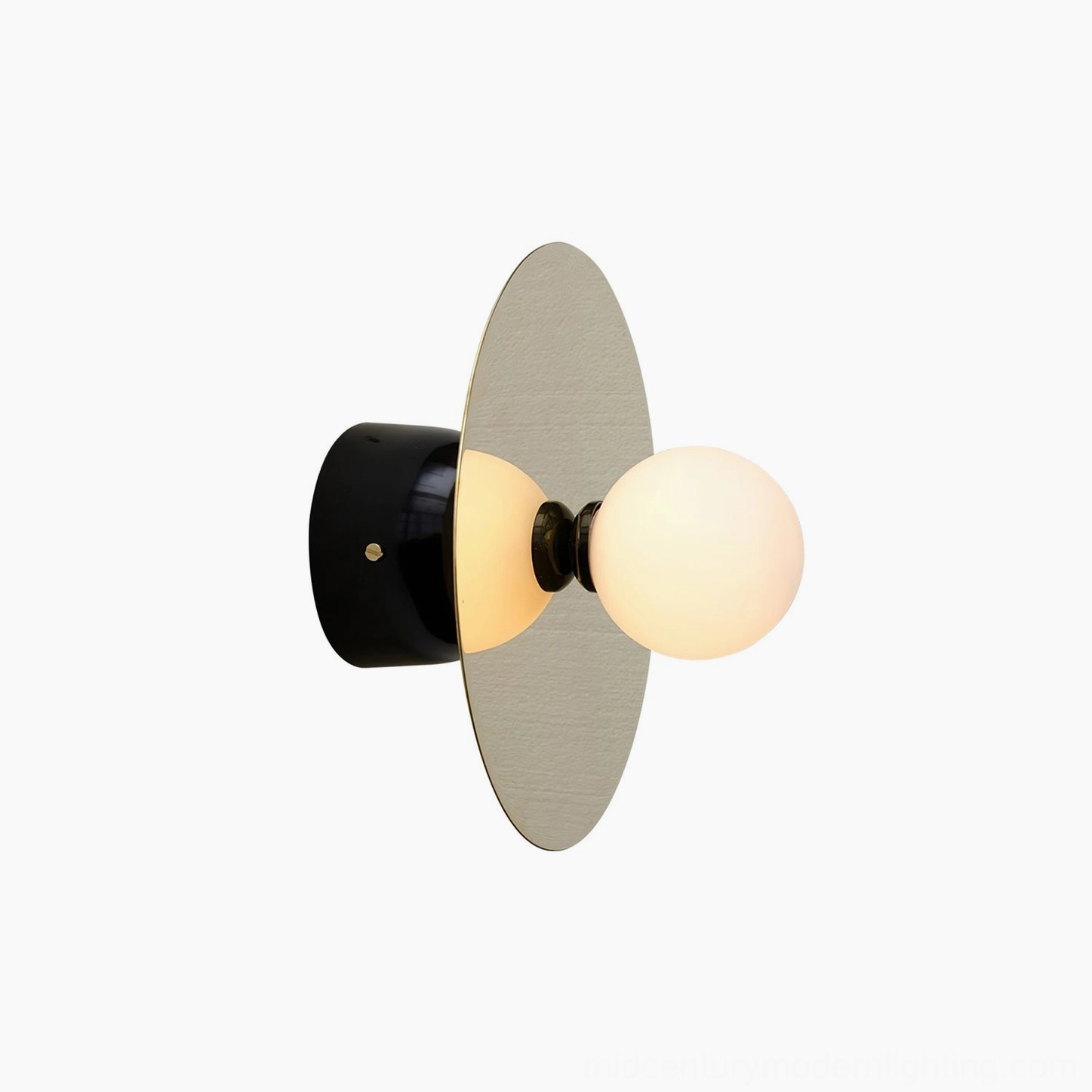 Single disc and sphere wall light mounted on accent wall in modern residential interior