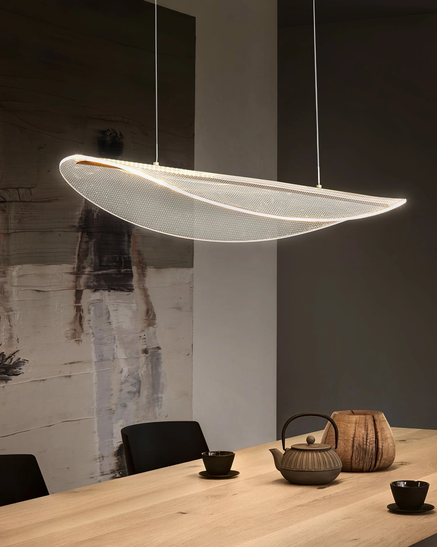 Modern floating mesh pendant creating ambient light with frosted PMMA shade design