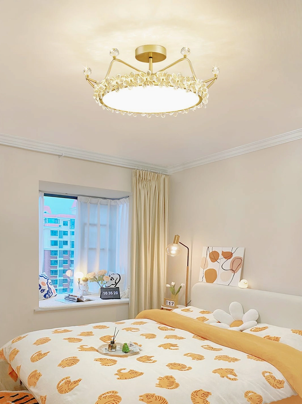 Petal crown ceiling light installed in contemporary bedroom, overhead downward angle in minimalist warm bedroom setting